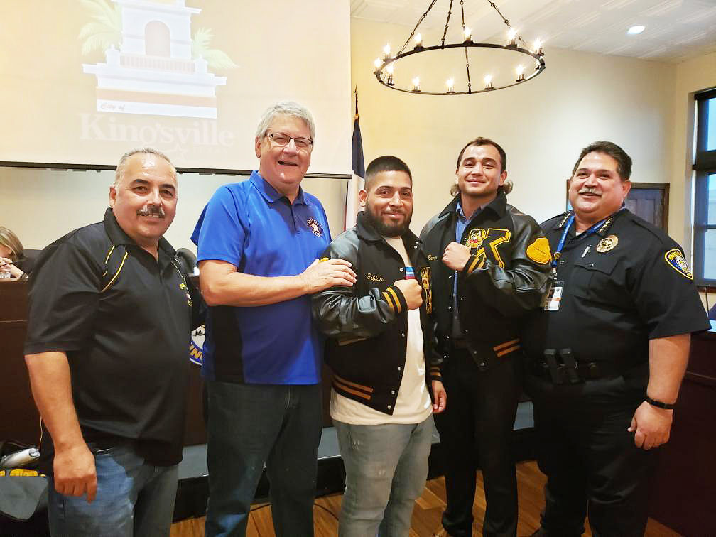 Two boxers earn letterman jackets for Golden Gloves